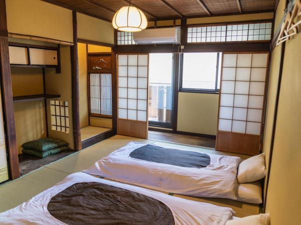 Guest House Hitsujian : photo 2 de la chambre chambre lits jumeaux avec balcon