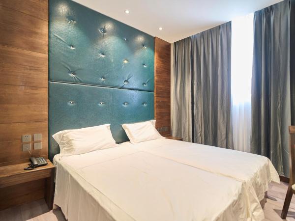 Menoir Dorsett Madrid Usera : photo 8 de la chambre chambre lits jumeaux avec salle de bains privative