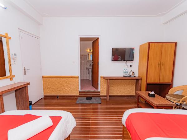 Basundhara Resort Pokhara : photo 5 de la chambre chambre lits jumeaux deluxe