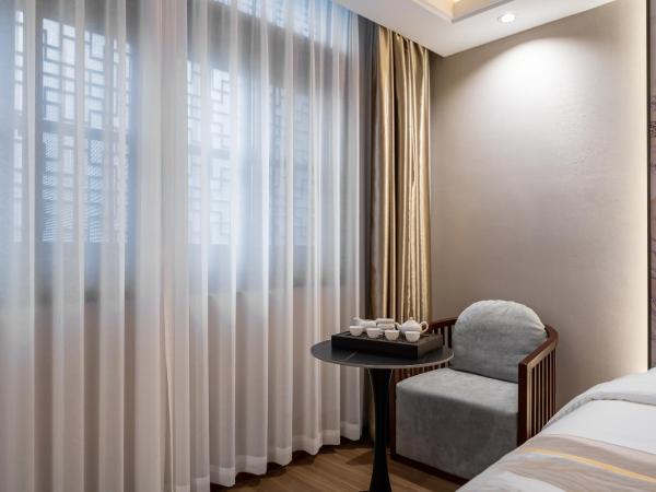 Rezen Retreat - Shanghai Sanjia Xintiandi Tourism Resort : photo 1 de la chambre chambre double avec 2 lits doubles