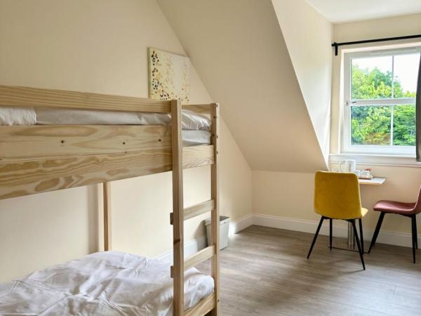 Edinburgh full house : photo 1 de la chambre chambre lits jumeaux - vue sur jardin