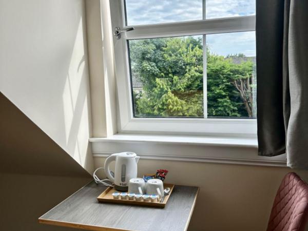 Edinburgh full house : photo 2 de la chambre chambre lits jumeaux - vue sur jardin