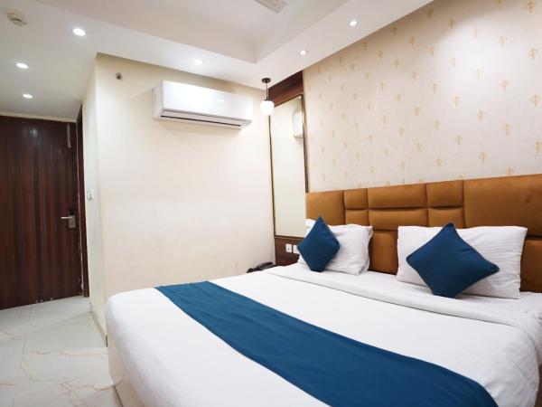 Hotel Leo Saffron - Corporate Stay Pitampura : photo 6 de la chambre chambre double deluxe