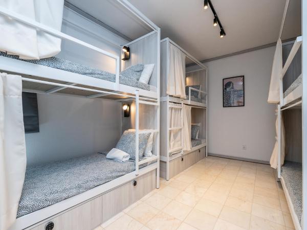 Walk in Hostel Faro Airport : photo 4 de la chambre lit simple dans dortoir pour femmes