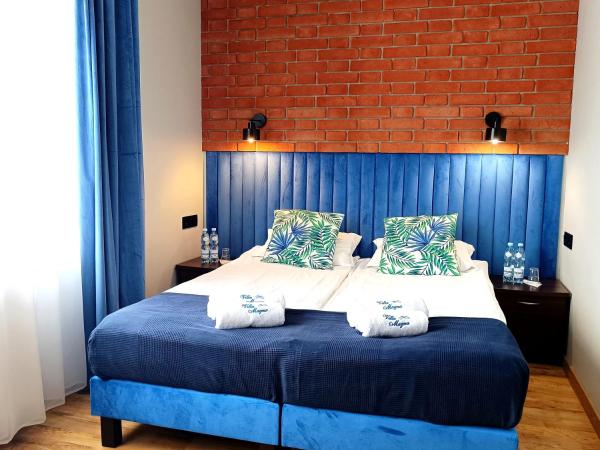 Villa Magna : photo 1 de la chambre chambre triple