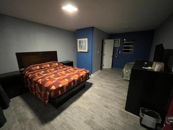 Cook's Motel- Panama City Beach : photo 3 de la chambre chambre lit queen-size