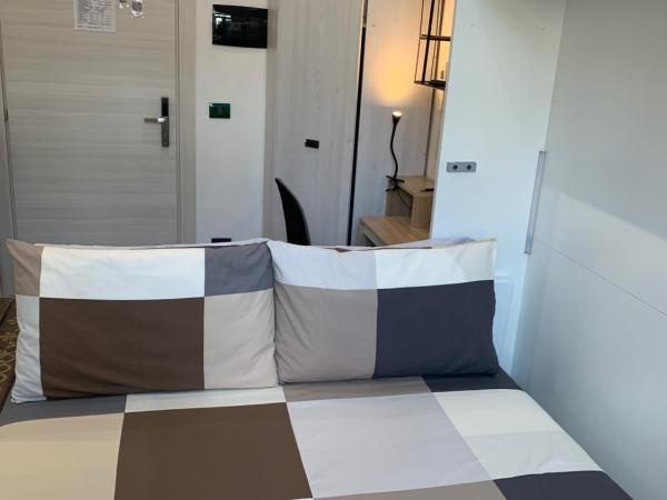 DROOMS 4,0 domotic smart self 24h,7 vicino treni Porta Susa e Centro Storico : photo 1 de la chambre chambre deluxe