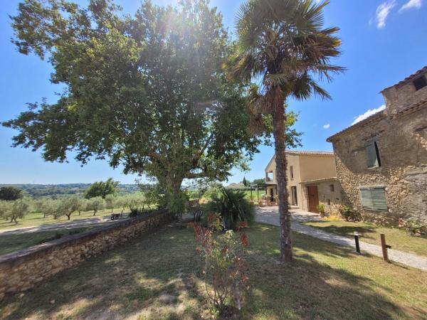 la bastide de l'adrech : photo 7 de la chambre chambre triple - vue sur jardin