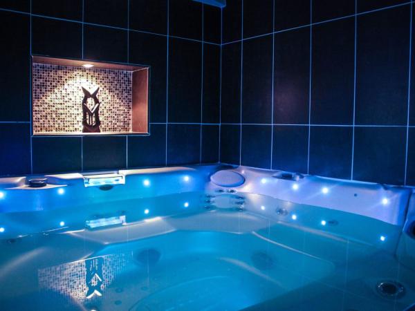 Love Room Evasion Duo : photo 1 de la chambre suite avec jacuzzi