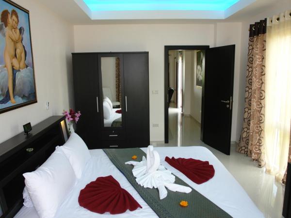 Blue Haven Beach Villas and Resort Apartments : photo 10 de la chambre appartement 1 chambre avec balcon et vue sur mer