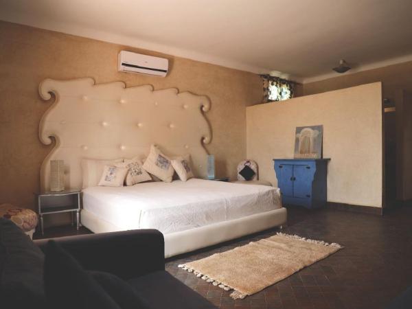 Maison d'Hôtes à Marrakech : photo 3 de la chambre chambre lit king-size - vue sur jardin