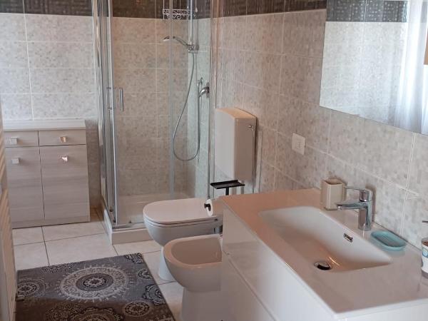 L' Arcangelo-Locazione Turistica : photo 2 de la chambre grande chambre double