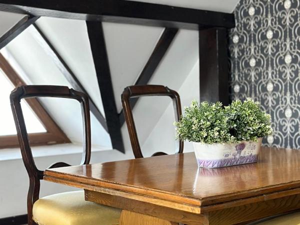 Pensjonat Gogol.s : photo 6 de la chambre chambre quadruple avec salle de bains privative