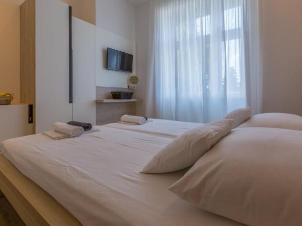 VILLA ERIKA : photo 2 de la chambre chambre double ou lits jumeaux standard