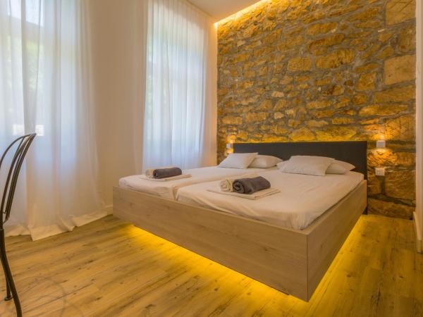 VILLA ERIKA : photo 1 de la chambre studio avec lit queen-size