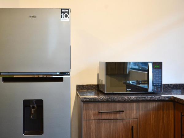 Casa Palmas : photo 2 de la chambre appartement - rez-de-chaussée