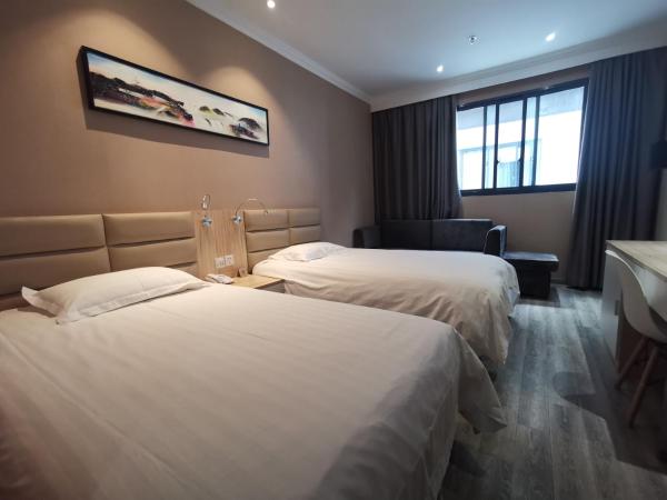 Wuxi Fish Inn Rongxiang : photo 1 de la chambre chambre lits jumeaux standard