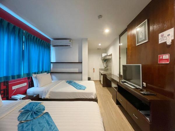 Arawana Express Chinatown : photo 10 de la chambre chambre lits jumeaux de luxe avec fenêtre