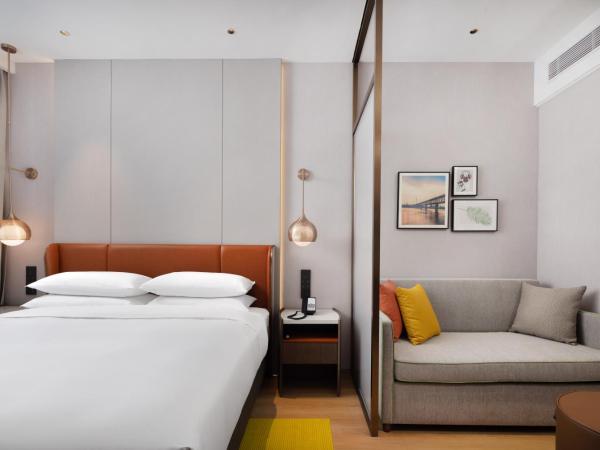 Home2 Suite by Hilton Wuhan Economic Development Zone : photo 1 de la chambre chambre double deluxe