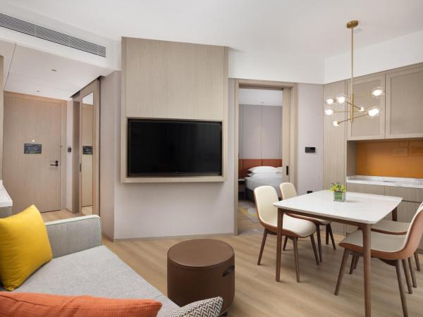 Home2 Suite by Hilton Wuhan Economic Development Zone : photo 3 de la chambre suite