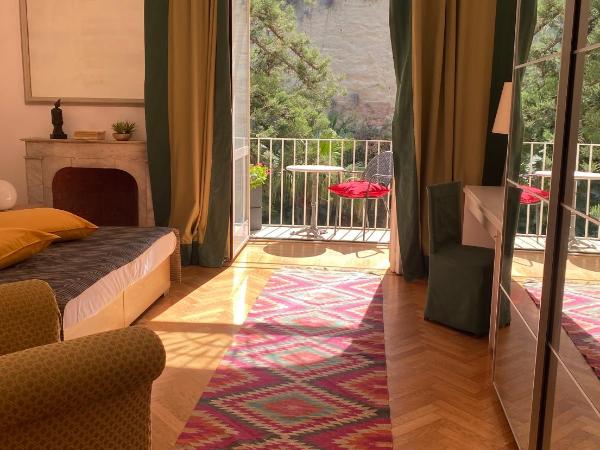 Palazzo Mele Residence : photo 4 de la chambre chambre double ou lits jumeaux supérieure - vue sur jardin