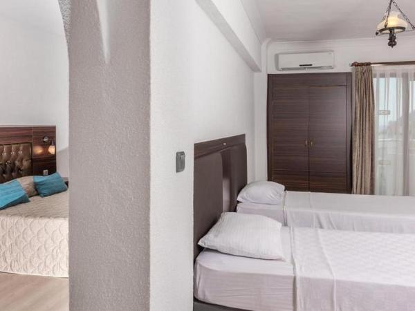 Marmaris All Inclusive Hotel : photo 4 de la chambre chambre triple - vue sur jardin