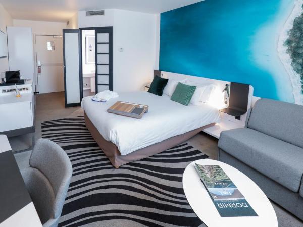 Novotel Luxembourg Centre : photo 2 de la chambre chambre exécutive avec lit queen-size et canapé