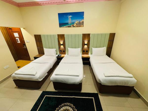 Three Dot Hotel : photo 2 de la chambre chambre triple