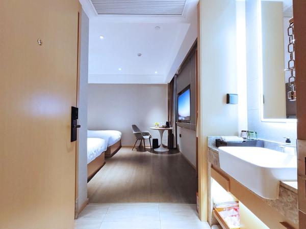 Paco Hotel Guangzhou South Railway Station Panyu Changlong Branch : photo 4 de la chambre chambre double