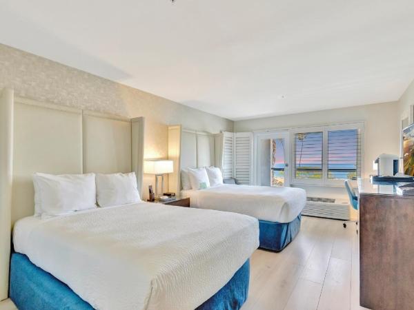 Ocean View Hotel : photo 1 de la chambre chambre double de luxe avec deux lits doubles - vue sur l'océan