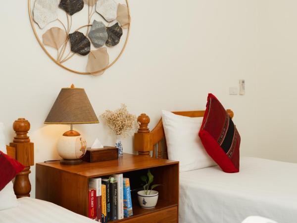 Gordnuea Boutique House : photo 5 de la chambre chambre lits jumeaux standard