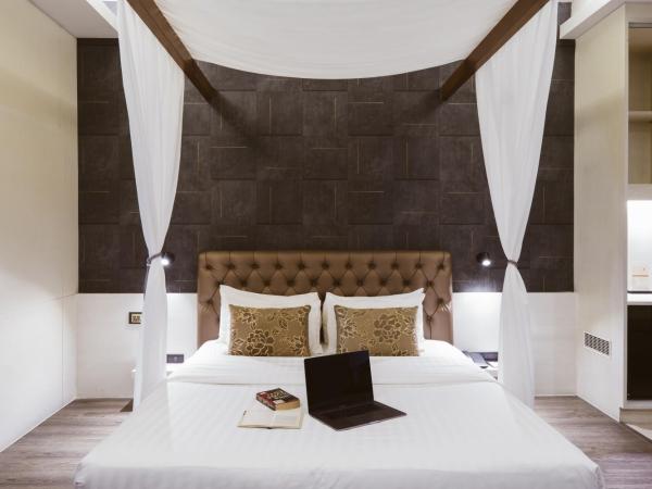 De Chai Colonial Hotel & Spa - SHA Plus : photo 1 de la chambre grande chambre double ou lits jumeaux deluxe