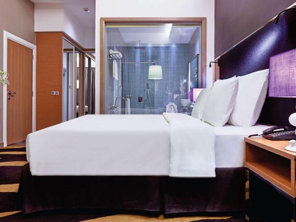 Wyndham Grand Bangsar Kuala Lumpur : photo 1 de la chambre grande chambre lit king-size deluxe