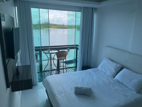 Pousada Seven Sunset Club Marambaia : photo 8 de la chambre suite lit queen-size – vue sur mer
