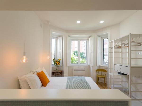 Vila Julieta Guesthouse : photo 7 de la chambre chambre lit queen-size - vue sur jardin