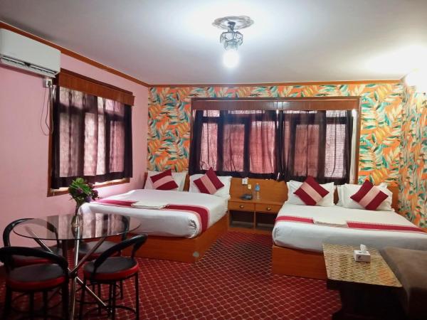 Kusum Hotel : photo 1 de la chambre chambre double familiale