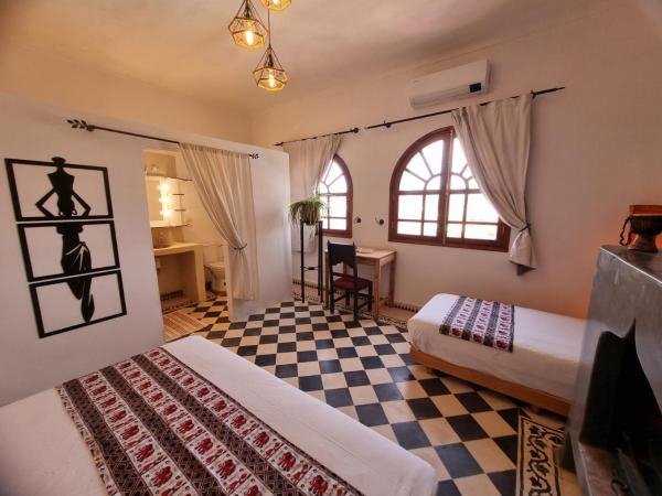 Dar Essaada : photo 1 de la chambre chambre double - vue sur piscine