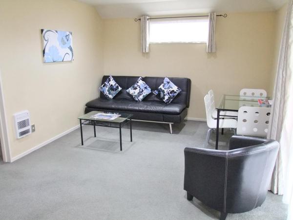 ASURE Abbella Lodge Motel : photo 8 de la chambre appartement 2 chambres avec baignoire spa