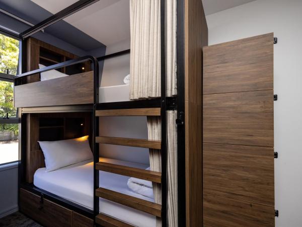 Haka House Rotorua : photo 2 de la chambre lit dans un dortoir de 4 lits