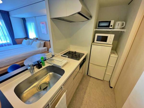 One's Residence Sapporo : photo 10 de la chambre chambre lits jumeaux avec salle de bains