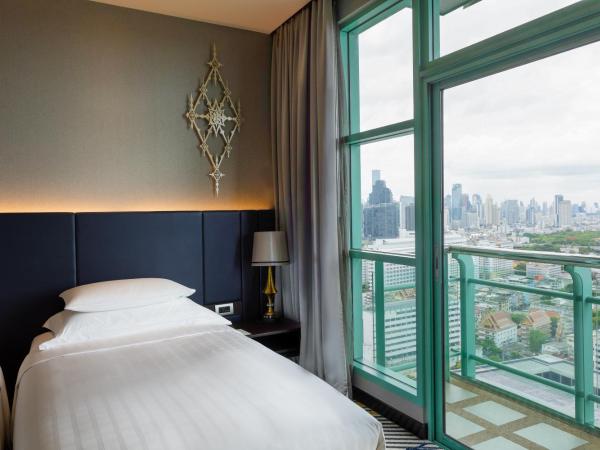 Hôtel Chatrium Riverside Bangkok : photo 7 de la chambre grande chambre deluxe lits jumeaux avec vue sur la ville 