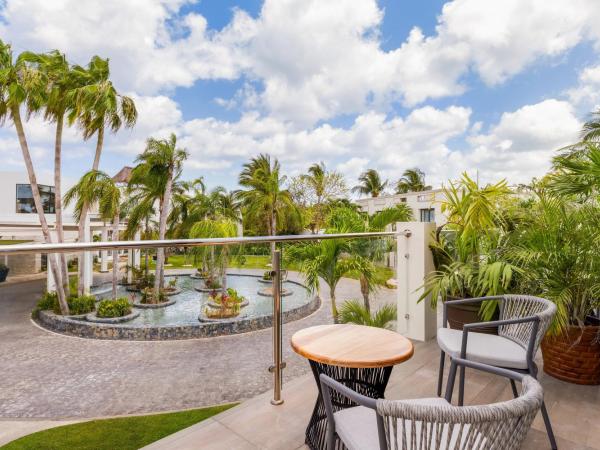 Dreams Cozumel Cape Resort & Spa : photo 6 de la chambre suite junior preferred club avec lits doubles - vue tropicale