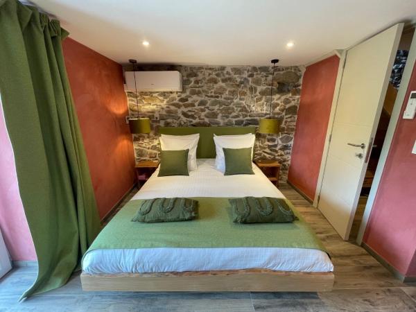 Les Chambres de Laurette : photo 2 de la chambre chambre double deluxe avec balcon