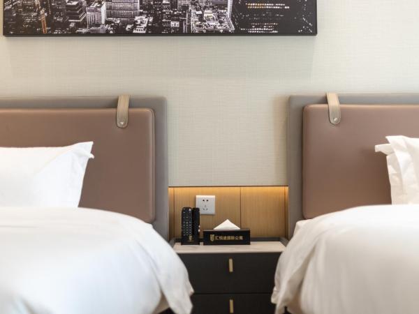 Raffles Executive Apartment - Guangzhou Huijin International Finance Center, Keyun Road Metro Station Branch-Canton Fair Free Shuttle : photo 6 de la chambre chambre lits jumeaux deluxe