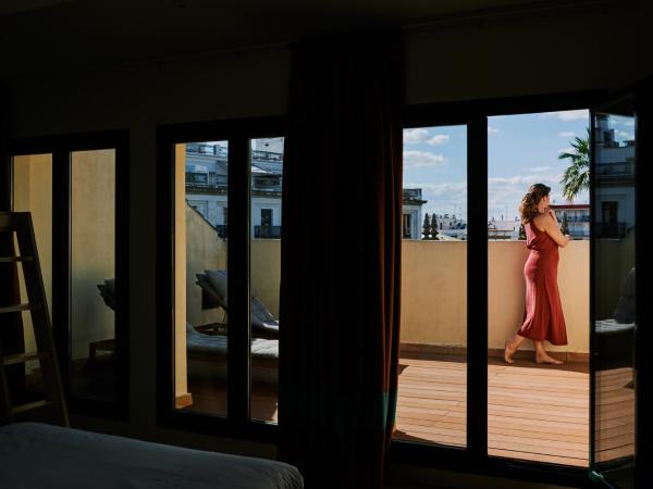 Toc Hostel Sevilla : photo 2 de la chambre chambre familiale avec terrasse