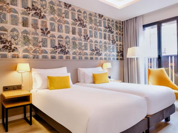 Motel One Madrid-Plaza de España : photo 3 de la chambre chambre lits jumeaux standard