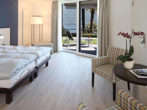 Hotel Stella SA : photo 3 de la chambre chambre double ou lits jumeaux design - vue sur lac