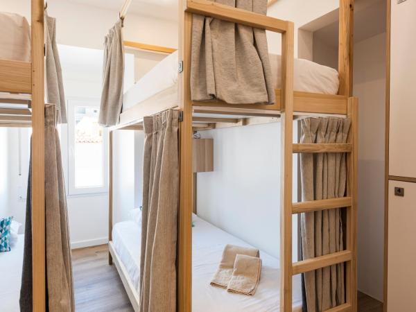 Madalena Hostel e Suites : photo 1 de la chambre lit dans dortoir pour femmes de 4 lits