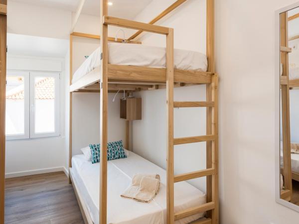 Madalena Hostel e Suites : photo 9 de la chambre lit dans dortoir pour femmes de 4 lits
