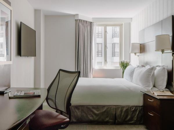 Club Quarters Hotel Embarcadero, San Francisco : photo 1 de la chambre petite chambre lit queen-size